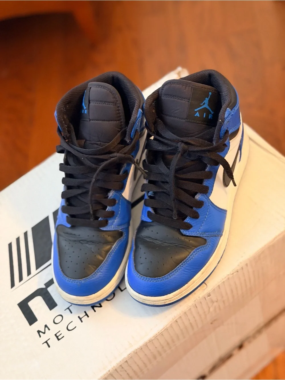 Jordan Men’s High-Top Sneakers in Blue/Black/White